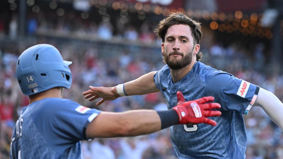 Jun 13, 2026; Washington, District of Columbia, USA; Washington Nationals center fielder Dylan Crews (3) celebrates scoring a run with catcher Drew Millas (14) against the Seattle Mariners during the seventh inning at Nationals Park. Mandatory Credit: Rafael Suanes-Imagn Images