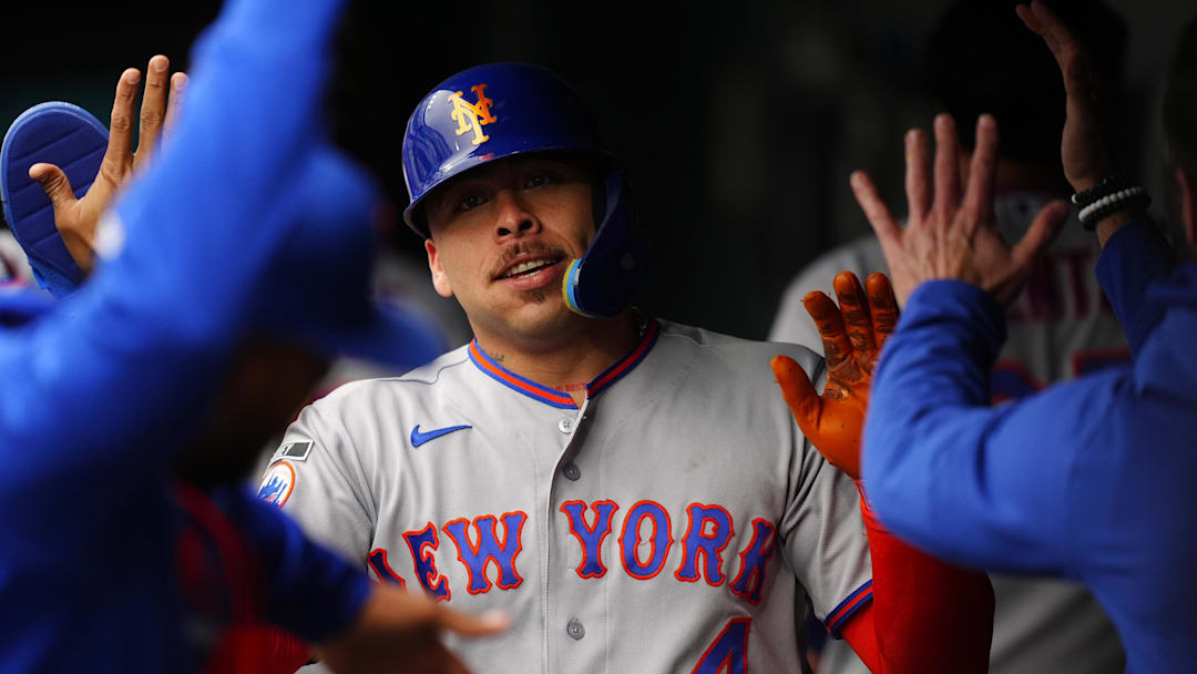 May 4, 2026; Denver, Colorado, USA; New York Mets designated hitter Francisco Alvarez (4) celebrates scoring a run in the sixth inning against the Colorado Rockies at Coors Field. Mandatory Credit: Ron Chenoy-Imagn Images