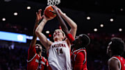 Dec 7, 2024; Tucson, Arizona, USA; Southern Utah Thunderbirds forward Jamari Sibley (14) and center Malik Lamin (32) battle for the rebound with Arizona Wildcats center Motiejus Krivas (14) during the second half at McKale Center. Mandatory Credit: Aryanna Frank-Imagn Images