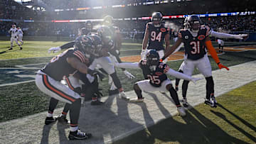 Bears linebacker D'Marco Jackson (48) and Bears slot cornerback  C.J. Gardner-Johnson (35) celebrate after an interception.