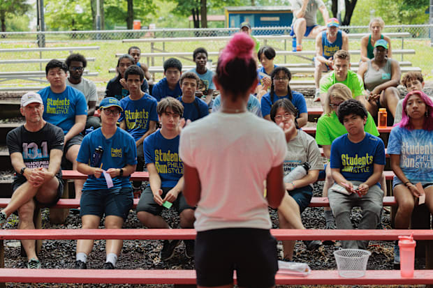 Students prepare for a road race.