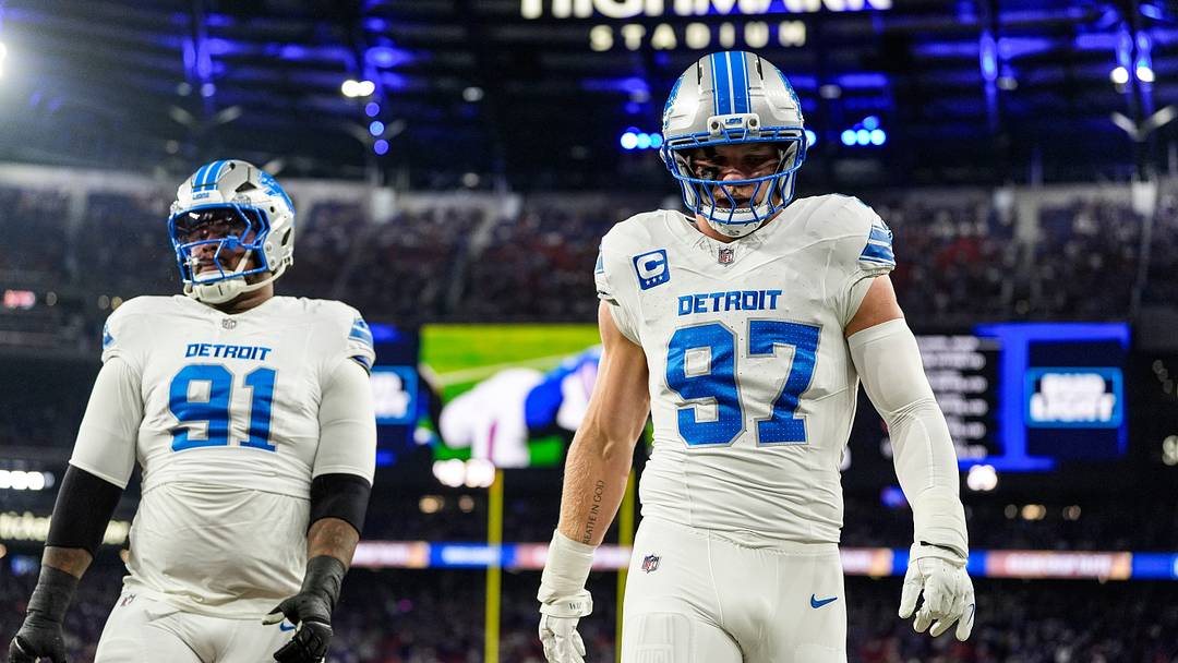Detroit Lions edge rusher Aidan Hutchinson (97), right, and defensive lineman Tyleik Williams (91) warm up ahead of the game between Detroit Lions and Buffalo Bills at Highmark Stadium in Orchard Park, N.Y., on Thursday, Sept. 17, 2026.
