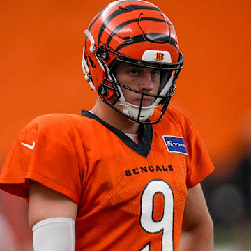 Cincinnati Bengals quarterback Joe Burrow (9) warms up before a preseason training camp practice in downtown Cincinnati on Thursday, July 31, 2025.