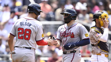 Jul 14, 2024; San Diego, California, USA; Atlanta Braves catcher Travis d'Arnaud (16) is congratulated by first baseman Matt Olson (28) after hitting a three-run home run against the San Diego Padres during the sixth inning at Petco Park.