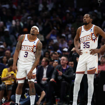 Jan 8, 2024; Los Angeles, California, USA;  Phoenix Suns guard Devin Booker (1) and guard Bradley Beal (3) and forward Kevin Durant (35) stands on the floor during the fourth quarter against the Los Angeles Clippers at Crypto.com Arena. Mandatory Credit: Kiyoshi Mio-USA TODAY Sports
