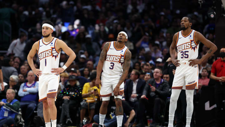 Jan 8, 2024; Los Angeles, California, USA;  Phoenix Suns guard Devin Booker (1) and guard Bradley Beal (3) and forward Kevin Durant (35) stands on the floor during the fourth quarter against the Los Angeles Clippers at Crypto.com Arena. Mandatory Credit: Kiyoshi Mio-USA TODAY Sports