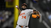 Jun 30, 2025; Arlington, Texas, USA; Baltimore Orioles relief pitcher Felix Bautista (74) pitches against the Texas Rangers during the ninth inning at Globe Life Field. Mandatory Credit: Jerome Miron-Imagn Images
