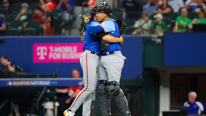 Jul 13, 2024; Arlington, TX, USA; National League Future  pitcher Bubba Chandler (l) hugs National League Future catcher Thayron Liranzo (r) after the game against the American League Future team during the Major league All-Star Futures game at Globe Life Field. 