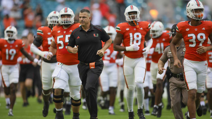 Oct 28, 2023; Miami Gardens, Florida, USA; Miami Hurricanes head coach Mario Cristobal takes on the field prior to the game against the Virginia Cavaliers at Hard Rock Stadium. Mandatory Credit: Sam Navarro-USA TODAY Sports