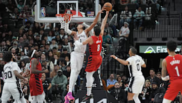 San Antonio Spurs center Victor Wembanyama (1) blocks a shot by Portland Trail Blazers forward Deni Avdija (8) in the second half at Frost Bank Center. Mandatory Credit: Daniel Dunn-Imagn Images