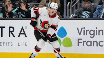 Dec 17, 2024; Seattle, Washington, USA;  Ottawa Senators forward Ridly Greig (71) skates with the puck against the Seattle Kraken at Climate Pledge Arena. Mandatory Credit: Stephen Brashear-Imagn Images