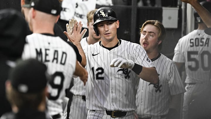 Sep 20, 2025; Chicago, Illinois, USA;  Chicago White Sox shortstop Colson Montgomery (12) celebrates in the dugout after he scores during the first inning against the San Diego Padres at Rate Field. Mandatory Credit: Matt Marton-Imagn Images