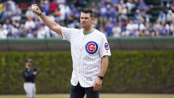 May 6, 2023; Chicago, Illinois, USA; Former Chicago Cubs pitcher Kerry Wood throws out a ceremonial first pitch on the twenty year anniversary of his twenty strike out game against the Houston Astros. at Wrigley Field.