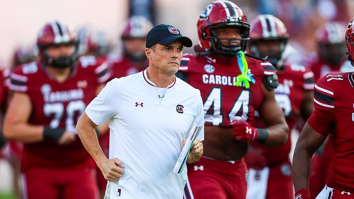 Nov 22, 2025; Columbia, South Carolina, USA; South Carolina Gamecocks head coach Shane Beamer leads his team onto the field before their game against the Coastal Carolina Chanticleers at Williams-Brice Stadium. Mandatory Credit: Jeff Blake-Imagn Images