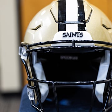 Mar 11, 2023; Metairie, LA, USA;  Detailed view of New Orleans Saints helmet at Ochsner Sports Performance Center. Mandatory Credit: Stephen Lew-Imagn Images