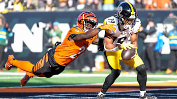 Pittsburgh Steelers wide receiver Calvin Austin III (19) catches a touchdown pass under coverage from Cincinnati Bengals cornerback Mike Hilton (21) in the second quarter of the NFL Week 13 game between the Cincinnati Bengals and the Pittsburgh Steelers at Paycor Stadium in downtown Cincinnati on Sunday, Dec. 1, 2024.