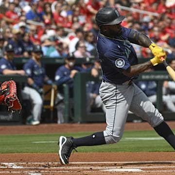 Seattle Mariners left fielder Randy Arozarena hits a single during a game against the St. Louis Cardinals on Sunday at Busch Stadium.