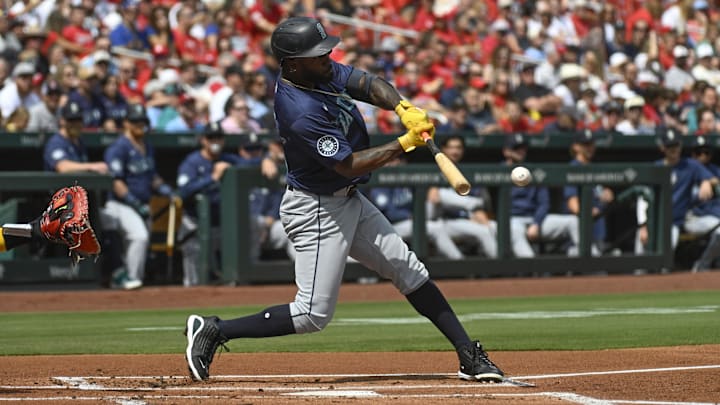 Seattle Mariners left fielder Randy Arozarena hits a single during a game against the St. Louis Cardinals on Sunday at Busch Stadium.