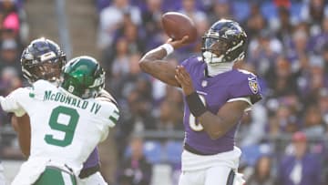 Nov 23, 2025; Baltimore, Maryland, USA; Baltimore Ravens quarterback Lamar Jackson (8) throws a pass during the second quarter against the New York Jets at M&T Bank Stadium. Mandatory Credit: Peter Casey-Imagn Images