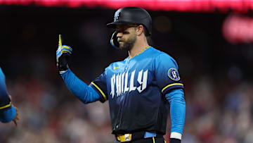 May 16, 2025; Philadelphia, Pennsylvania, USA; Philadelphia Phillies first base Bryce Harper (3) reacts after hitting his 1000 career RBI on a single during the fifth inning against the Pittsburgh Pirates at Citizens Bank Park.
