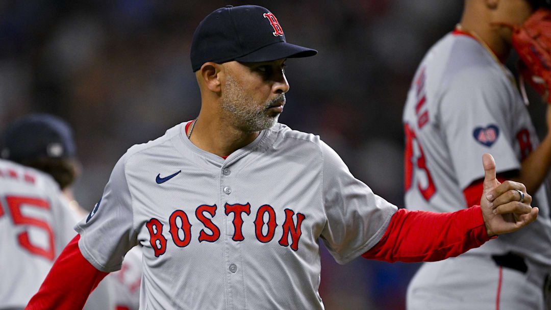 Boston Red Sox manager Alex Cora (13) gives a thumbs up to the umpire during the sixth inning against the Texas Rangers at Globe Life Field.