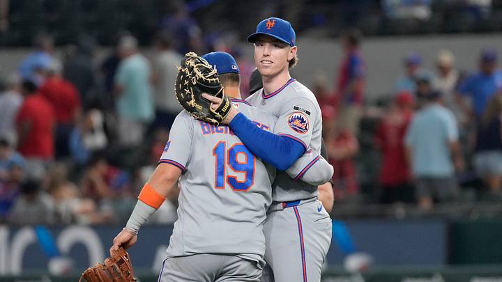 Sep 23, 2026; Arlington, Texas, USA;  New York Mets third baseman Bo Bichette (19) and third baseman Brett Baty (7) hug  after defeating the against the Texas Rangers at Globe Life Field. Mandatory Credit: Raymond Carlin III-Imagn Images