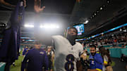 Oct 30, 2025; Miami Gardens, Florida, USA; Baltimore Ravens quarterback Lamar Jackson (8) walks off the field after a win over Miami Dolphins at Hard Rock Stadium. Mandatory Credit: Sam Navarro-Imagn Images