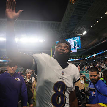 Oct 30, 2025; Miami Gardens, Florida, USA; Baltimore Ravens quarterback Lamar Jackson (8) walks off the field after a win over Miami Dolphins at Hard Rock Stadium. Mandatory Credit: Sam Navarro-Imagn Images