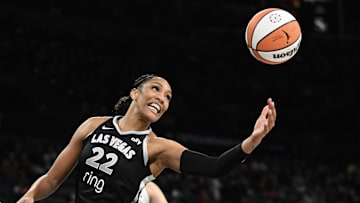 May 23, 2025; Las Vegas, Nevada, USA; Las Vegas Aces center A'ja Wilson (22) grabs a rebound against the Washington Mystics in the first quarter of their game at Michelob Ultra Arena. Mandatory Credit: Candice Ward-Imagn Images