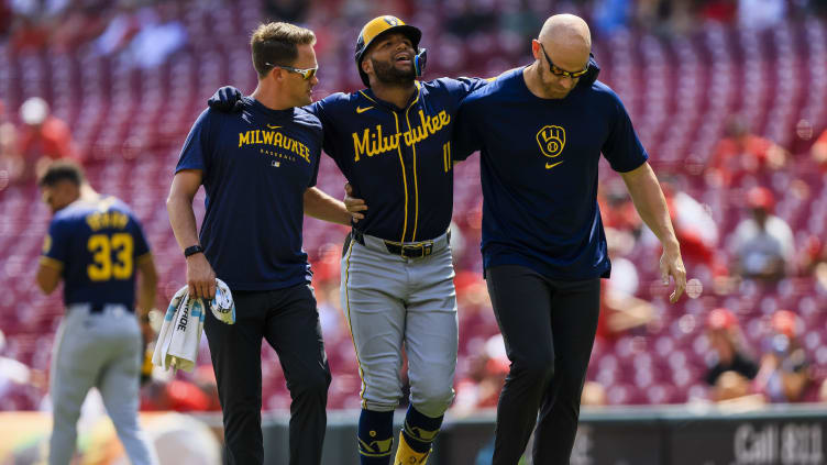 Aug 30, 2024; Cincinnati, Ohio, USA; Milwaukee Brewers outfielder Jackson Chourio (11) walks off the field in the fifth inning against the Cincinnati Reds at Great American Ball Park. Mandatory Credit: Katie Stratman-USA TODAY Sports