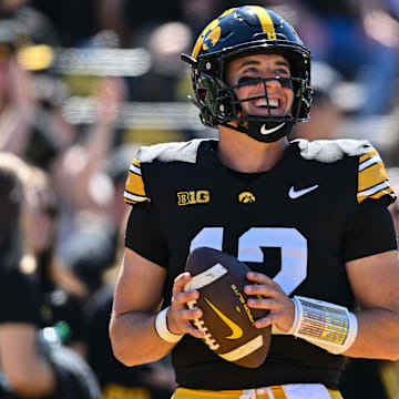 Sep 7, 2024; Iowa City, Iowa, USA; Iowa Hawkeyes quarterback Cade McNamara (12) looks on before the game against the Iowa State Cyclones at Kinnick Stadium. Mandatory Credit: Jeffrey Becker-Imagn Images