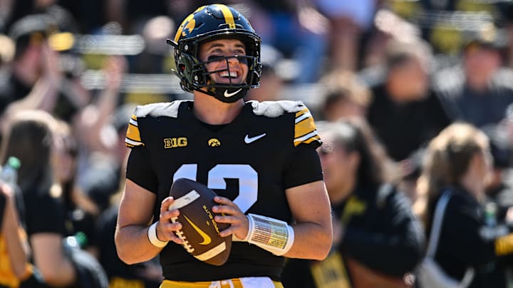 Sep 7, 2024; Iowa City, Iowa, USA; Iowa Hawkeyes quarterback Cade McNamara (12) looks on before the game against the Iowa State Cyclones at Kinnick Stadium. Mandatory Credit: Jeffrey Becker-Imagn Images