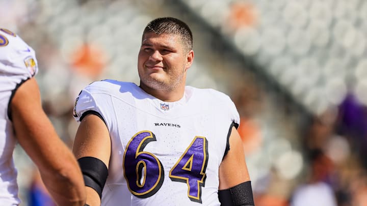 Oct 6, 2024; Cincinnati, Ohio, USA; Baltimore Ravens center Tyler Linderbaum (64) during warmups before the game against the Cincinnati Bengals at Paycor Stadium. Mandatory Credit: Katie Stratman-Imagn Images