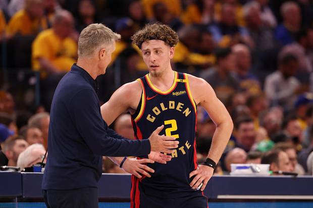 Golden State Warriors Golden State Warriors  Steve Kerr speaks with guard Brandin Podziemski. 