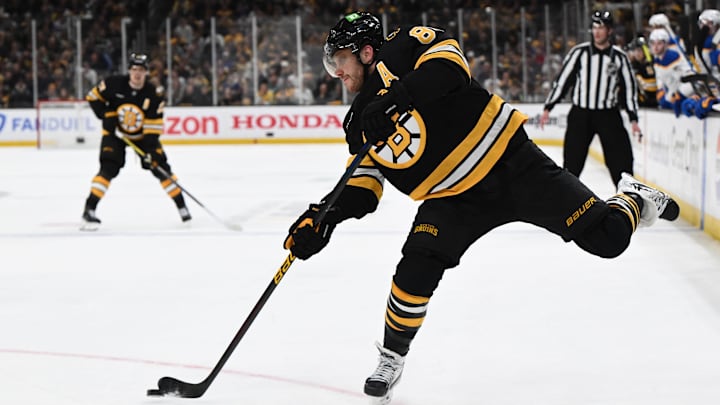 Apr 23, 2026; Boston, Massachusetts, USA; Boston Bruins right wing David Pastrnak (88) takes a shot against the Buffalo Sabres during the third period of game three of the first round of the 2026 Stanley Cup Playoffs at the TD Garden. Mandatory Credit: Brian Fluharty-Imagn Images
