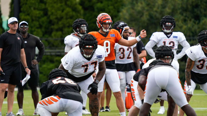 Bengals players and coaches run drills during their training camp on Tuesday August 13, 2024.