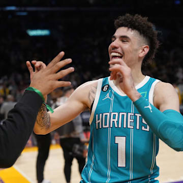 Dec 23, 2022; Los Angeles, California, USA; Charlotte Hornets guard LaMelo Ball (1) celebrates with Miles Bridges after the game against the Charlotte Hornets at Crypto.com Arena. The Hornets defeated the Lakers 134-130. Mandatory Credit: Kirby Lee-USA TODAY Sports