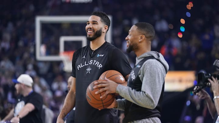 Feb 15, 2025; Oakland, CA, USA; Shaq’s OGs forward Jayson Tatum (0) of the Boston Celtics interacts with guard Damian Lillard (0) of the Milwaukee Bucks during the NBA All Star-Practice at Oracle Arena. Mandatory Credit: Cary Edmondson-Imagn Images Feb 15, 2025; Oakland, CA, USA; Shaq’s OGs forward Jayson Tatum (0) of the Boston Celtics interacts with guard Damian Lillard (0) of the Milwaukee Bucks during the NBA All Star-Practice at Oracle Arena. Mandatory Credit: Cary Edmondson-Imagn Images