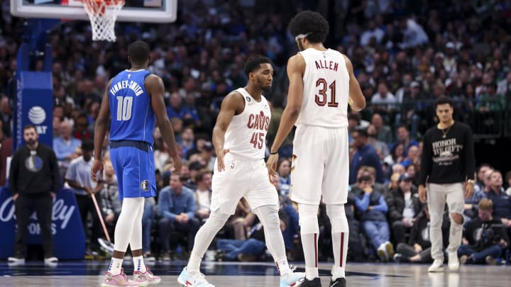 Dec 14, 2022; Dallas, Texas, USA;  Cleveland Cavaliers guard Donovan Mitchell (45) celebrates with Cleveland Cavaliers center Jarrett Allen (31) during the second quarter against the Dallas Mavericks at American Airlines Center. Mandatory Credit: Kevin Jairaj-USA TODAY Sports