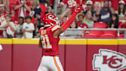 Aug 22, 2024; Kansas City, Missouri, USA; Kansas City Chiefs safety Jaden Hicks (21) celebrates against the Chicago Bears after recovering a fumble during the first half at GEHA Field at Arrowhead Stadium. Mandatory Credit: Denny Medley-Imagn Images