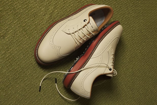 Tan golf shoes.