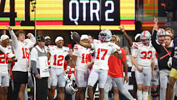 Jan 20, 2025; Atlanta, GA, USA; Ohio State Buckeyes wide receiver Carnell Tate (17) reacts after a play against the Notre Dame Fighting Irish during the first half the CFP National Championship college football game at Mercedes-Benz Stadium. Mandatory Credit: Mark J. Rebilas-Imagn Images