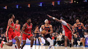 Feb 27, 2024; New York, New York, USA; New York Knicks guard Josh Hart (3) drives to the basket against New Orleans Pelicans forward Herbert Jones (5) and guard Trey Murphy III (25) and forwards Zion Williamson (1) and Brandon Ingram (14) during the first quarter at Madison Square Garden. Mandatory Credit: Brad Penner-Imagn Images