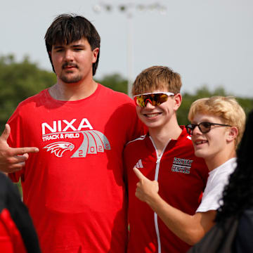 Fans lines up to have their photo taken with Nixa junior Jackson Cantwell after he competed in the shot put championship on May 31, 2025, in Jefferson City. Cantwell, the No. 1 football recruit in the 2026 class, committed to Miami (Florida) earlier in the month.