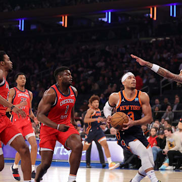 Feb 27, 2024; New York, New York, USA; New York Knicks guard Josh Hart (3) drives to the basket against New Orleans Pelicans forward Herbert Jones (5) and guard Trey Murphy III (25) and forwards Zion Williamson (1) and Brandon Ingram (14) during the first quarter at Madison Square Garden. Mandatory Credit: Brad Penner-Imagn Images