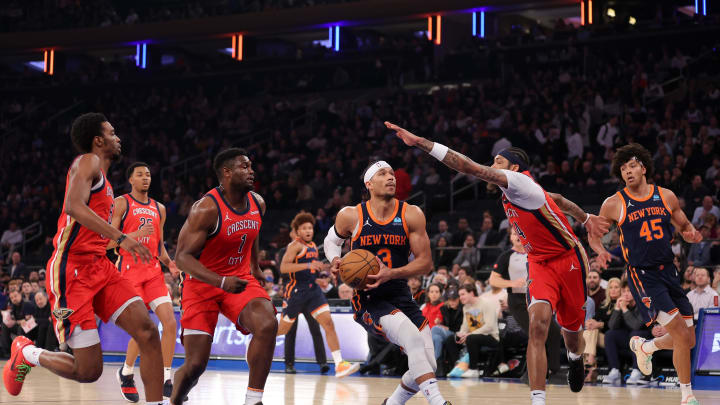 Feb 27, 2024; New York, New York, USA; New York Knicks guard Josh Hart (3) drives to the basket against New Orleans Pelicans forward Herbert Jones (5) and guard Trey Murphy III (25) and forwards Zion Williamson (1) and Brandon Ingram (14) during the first quarter at Madison Square Garden