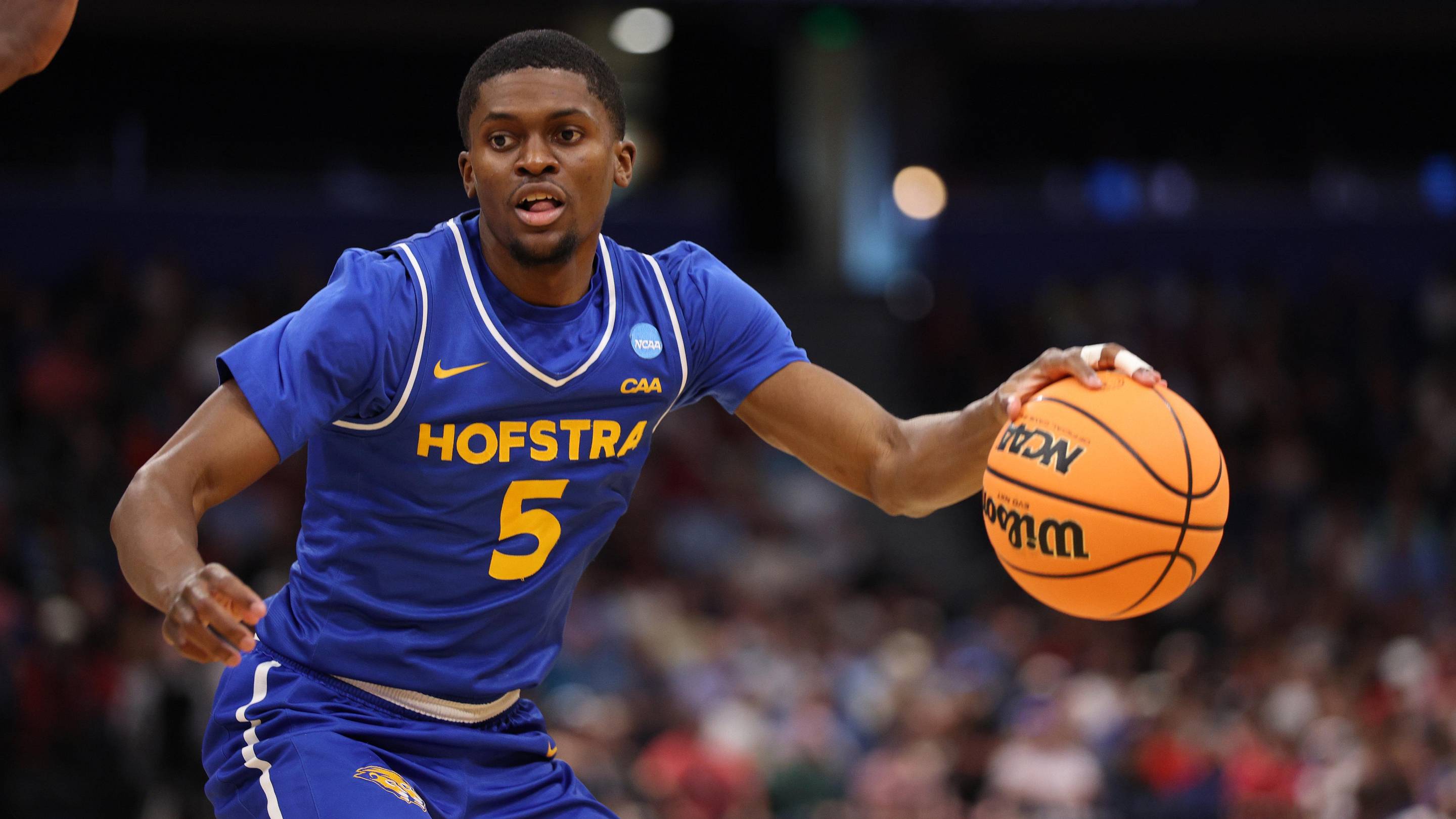 Mar 20, 2026; Tampa, FL, USA; Hofstra Pride guard Cruz Davis (5) dribbles in the second half against the Alabama Crimson Tide during a first round game of the men's 2026 NCAA Tournament at Benchmark International Arena. Mandatory Credit: Nathan Ray Seebeck-Imagn Images | Nathan Ray Seebeck-Imagn Ima
