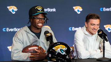 The Jacksonville Jaguars’ first-round pick, Colorado Buffaloes wide receiver and defensive back Travis Hunter, left, answers questions as General Manager James Gladstone, right, sits next to him during a press conference Friday, March 25, 2025 at Miller Electric Center in Jacksonville, Fla. [Doug Engle/Florida Times-Union]