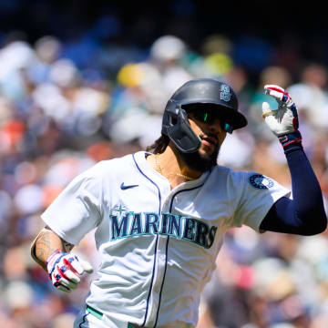Seattle Mariners shortstop JP Crawford runs towards first base after hitting a single against the Baltimore Orioles during the first inning of a game Thursday at T-Mobile Park.