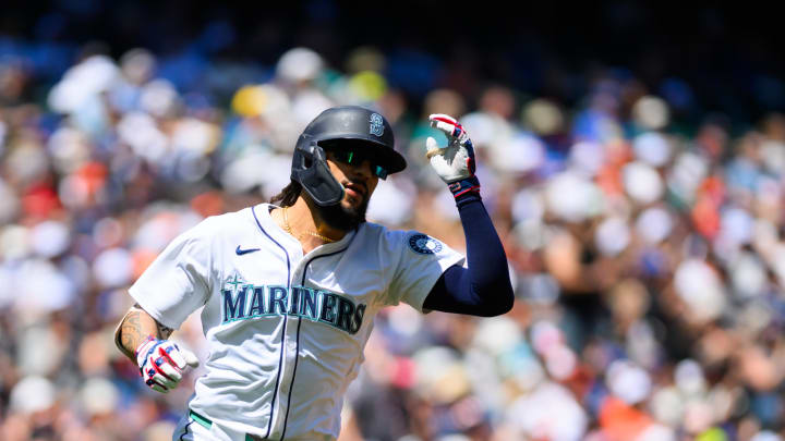 Seattle Mariners shortstop JP Crawford runs towards first base after hitting a single against the Baltimore Orioles during the first inning of a game Thursday at T-Mobile Park.